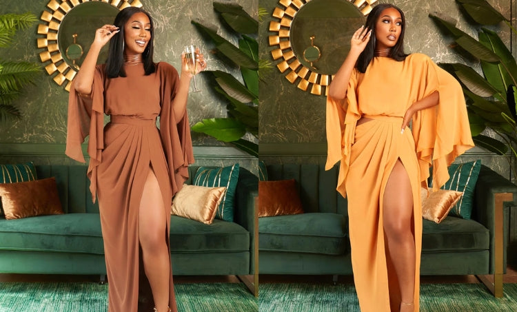 Woman modeling elegant maxi dresses in brown and mustard with flowing sleeves and high slit, styled for fall fashion indoors.